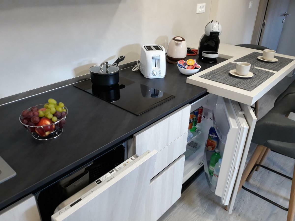 Center Apartment Dalu Pula Luaran gambar