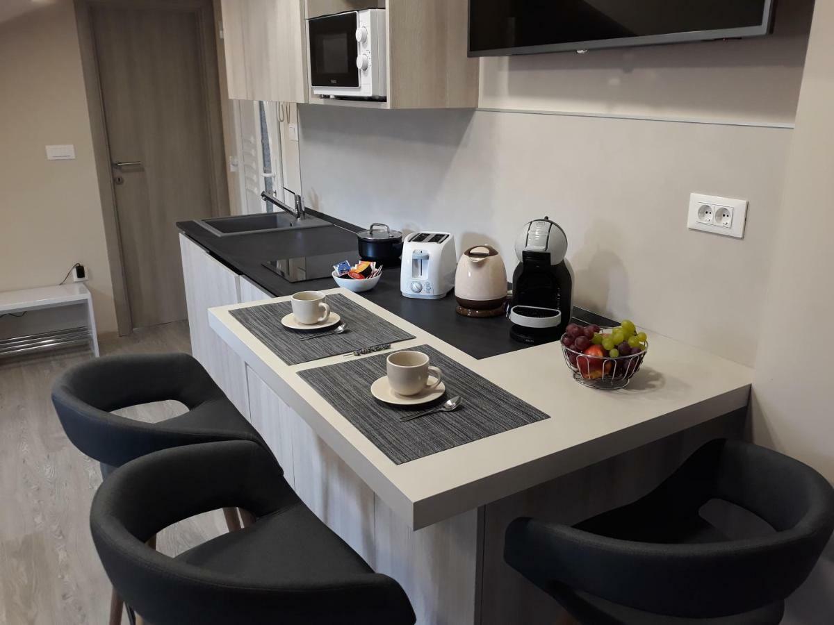 Center Apartment Dalu Pula Luaran gambar